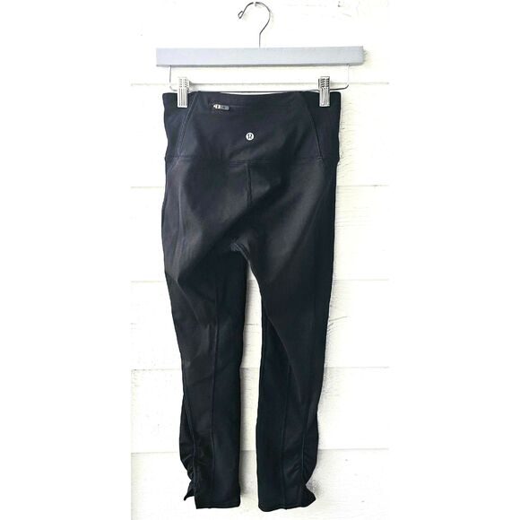 Women’s Lululemon Black Capri Leggings Size 4 –No Slip Waist- Easy On Ankle Slit - Picture 3 of 6